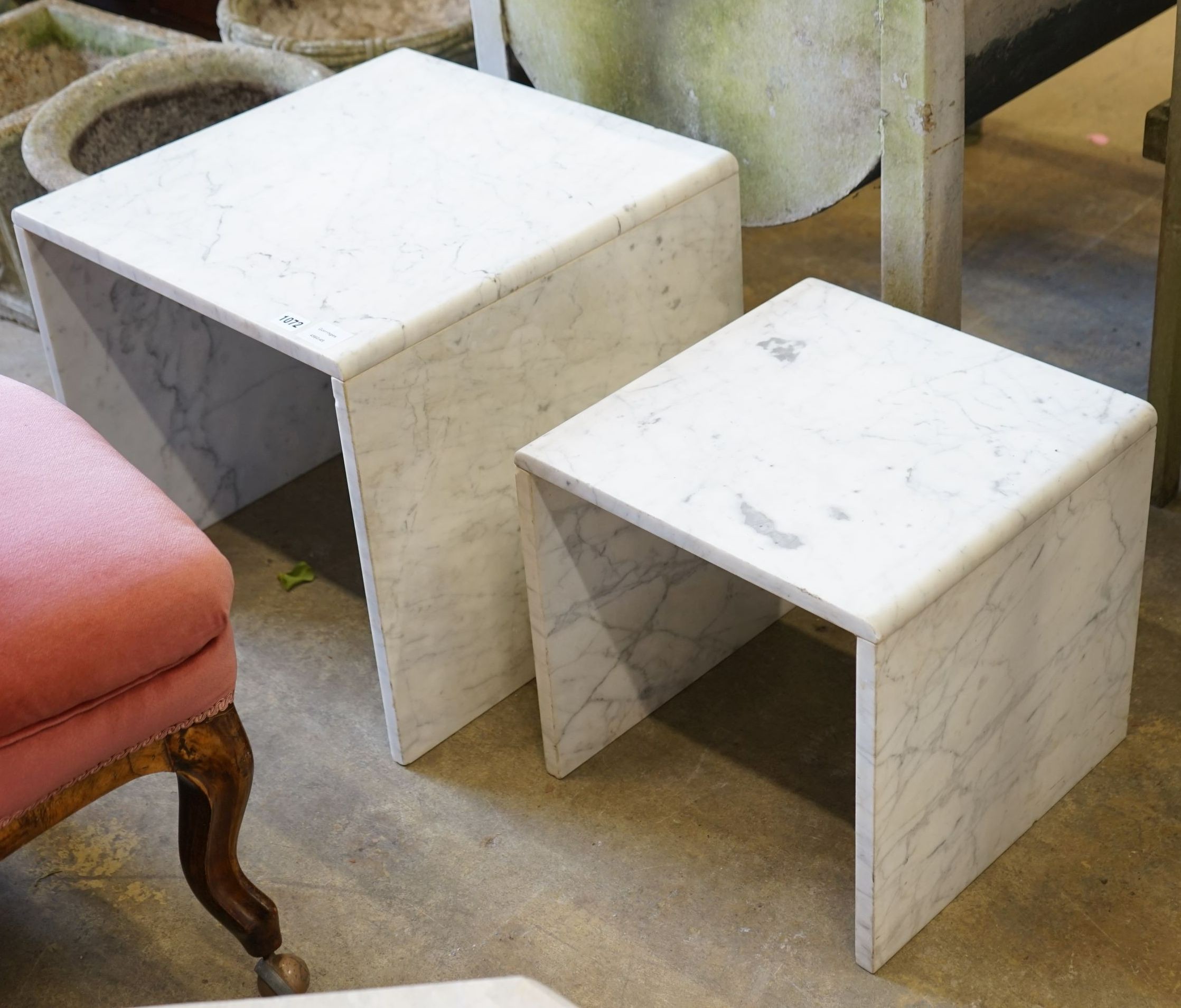 A pair of composite marble occasional tables, larger width 50cm, depth 50cm, height 44cm